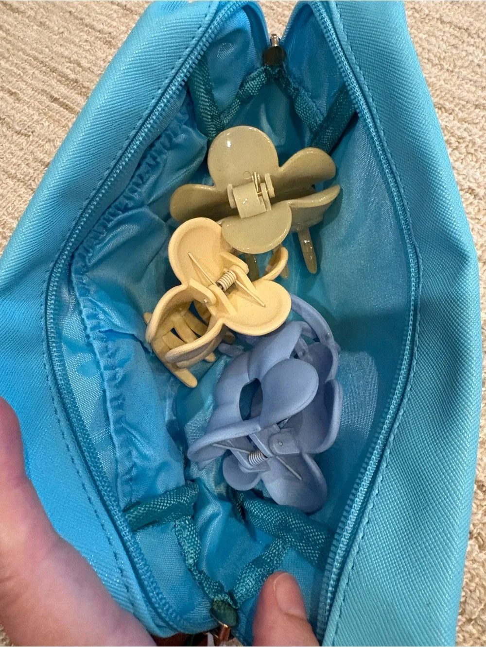 Blue Pouch with Flower Hair Clips